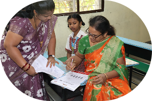 Teacher reviewing paper